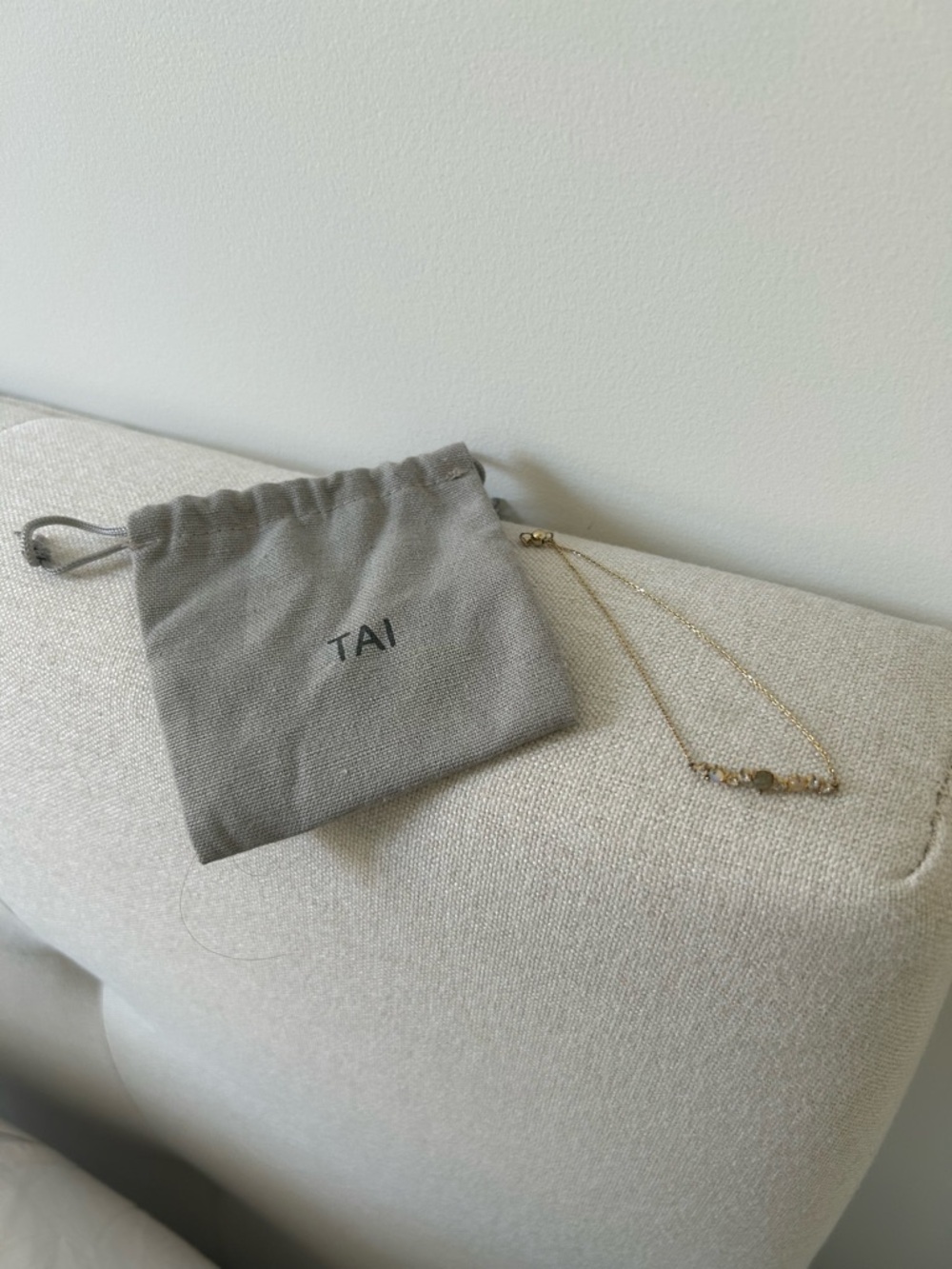 TAI Chain bracelet with multi stone bar. Bolo closure